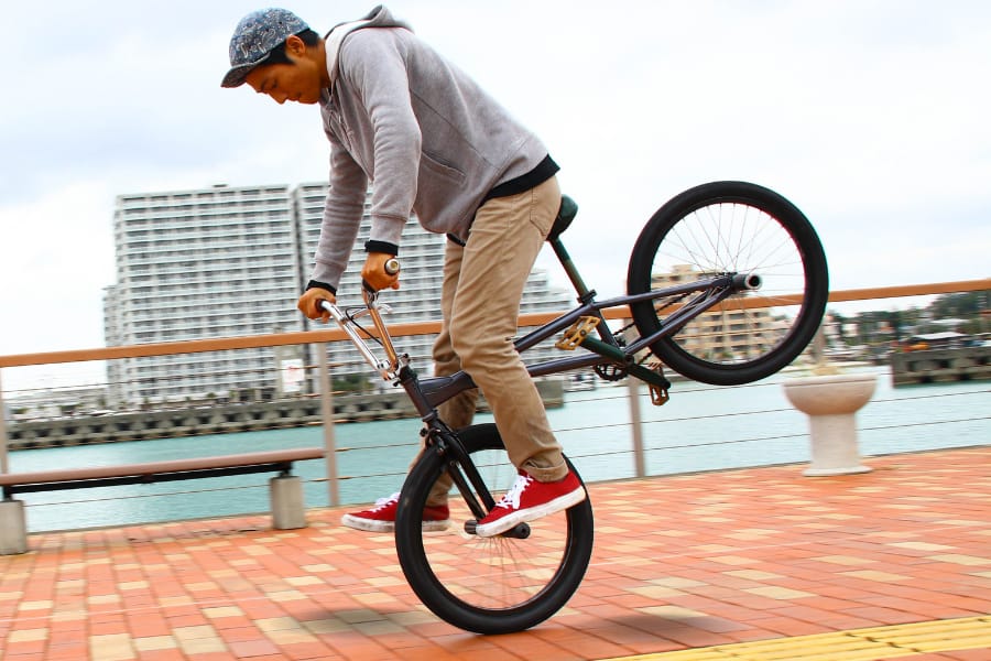 cyclist performing stunt with BMX bicycle